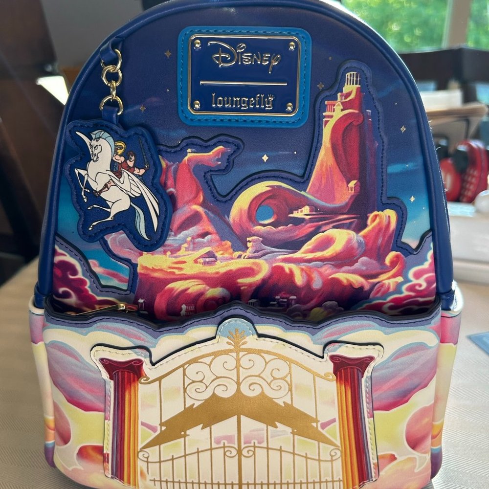 Loungefly Blue and Pink Disney Backpack with Magical Design